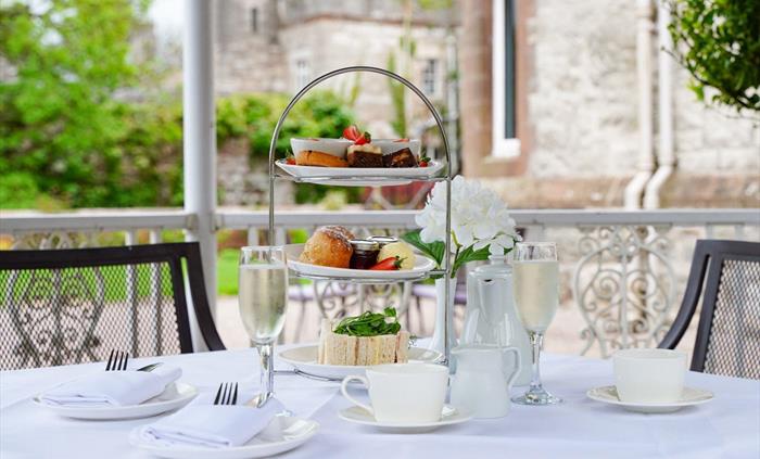 Classic sandwiches, decadent cakes and pastries, freshly baked scones, clotted cream and jam, freshly brewed tea and coffee. Why not add a glass of fi